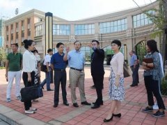 武汉市教育局副局长田文江一行莅临我校考察调研